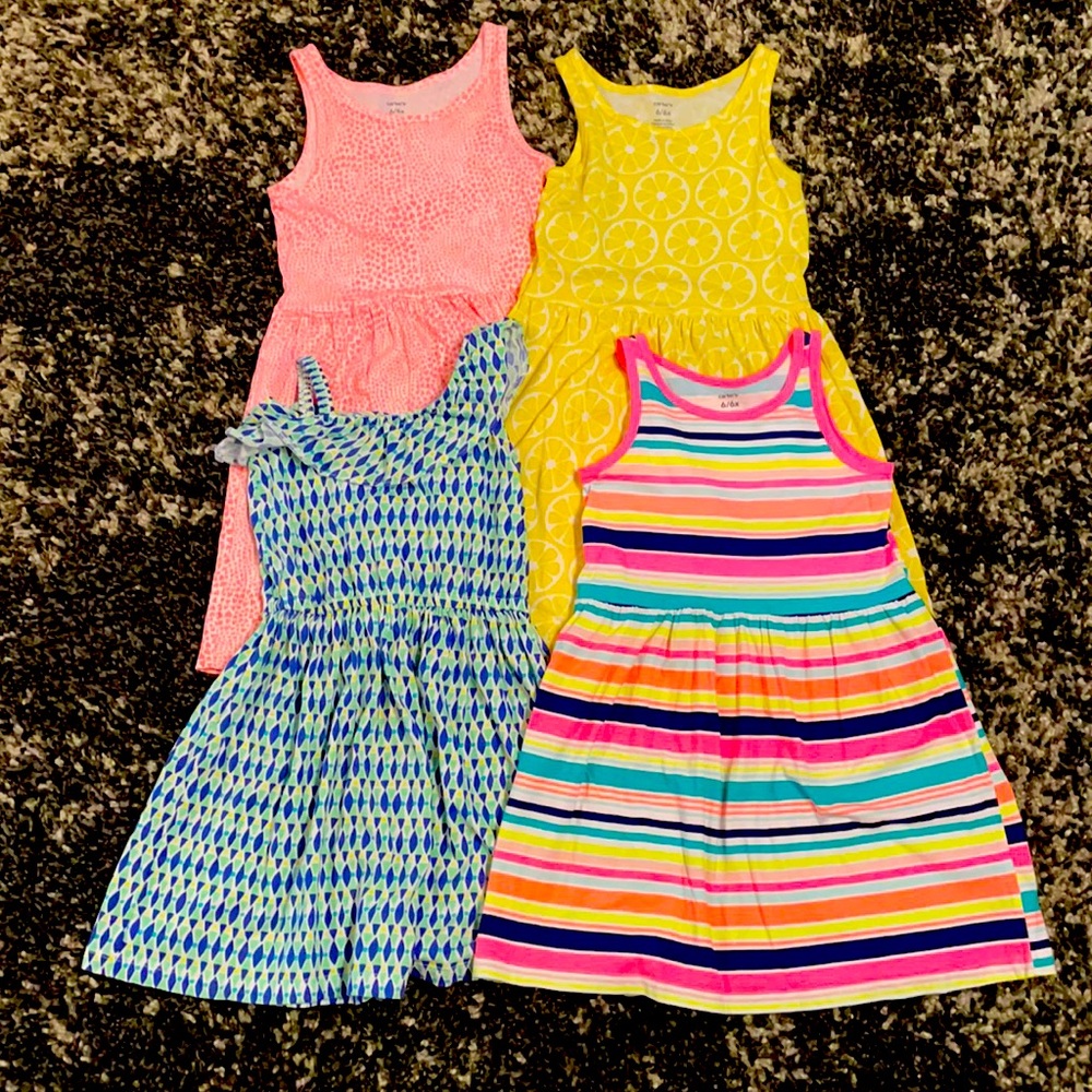 4 Carter’s Dresses. All are size 6/6X